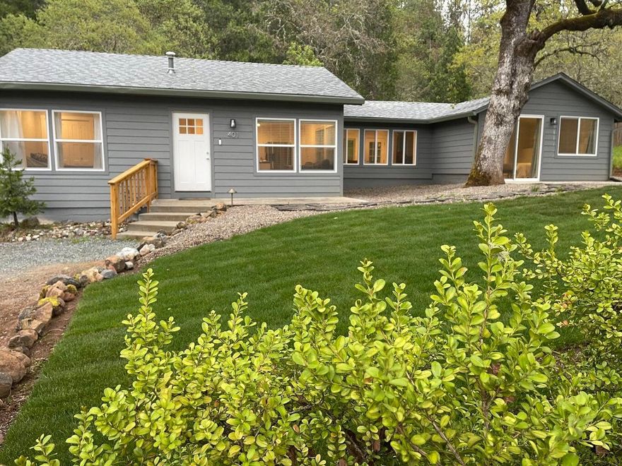 One level recently renovated beautiful country home on over a half-acre. Three bedrooms and Two bathrooms. Gorgeous kitchen, floors, paint, and lighting. The whole home had everything replaced, all appliances, insulation, drywall, lighting, gas furnace/ central air, siding, tile showers, windows, and tankless hot water heater. Home is like new and clean and full of sunshine. These photos were done prior to their move in.
This was going to be this young families forever home, however they are transferring back east with an incredible job opportunity. Which means opportunity for you - Great location, 10 mins to Grants Pass and under 30 mins to Medford. Ideal central location for families, professionals or retirement. Easy maintenance and very private, especially in the backyard. Fenced, some landscaping and just beautiful. Enjoy the nice, covered porch for BBQ's and the weather where it stays dry in the winter and cool in the summer. Efficient and just beautiful from top to bottom.