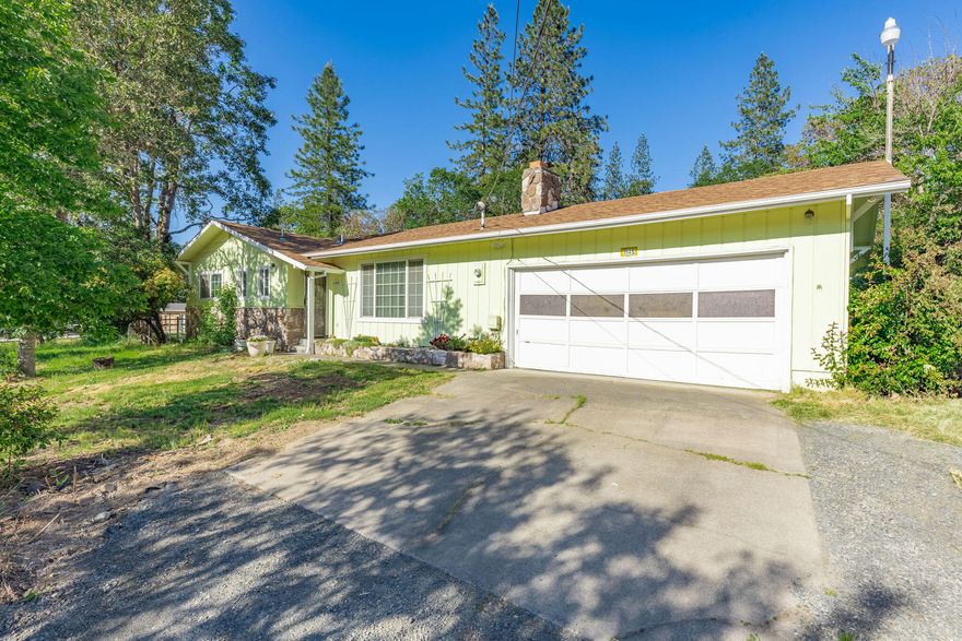 Cozy & updated, single-level home in the North Valley, within minutes to all conveniences!  Just over an acre with room for RV parking & other toys. Situated near the town of Merlin, with access to incredible outdoor beauty & activities. This home is move-in ready with a new roof, updated kitchen cabinets, flooring & paint!  Enjoy your favorite pastimes and hobbies in the backyard, whether you create your own private oasis or enjoy gardening with a 50-year old grapevine to boot!