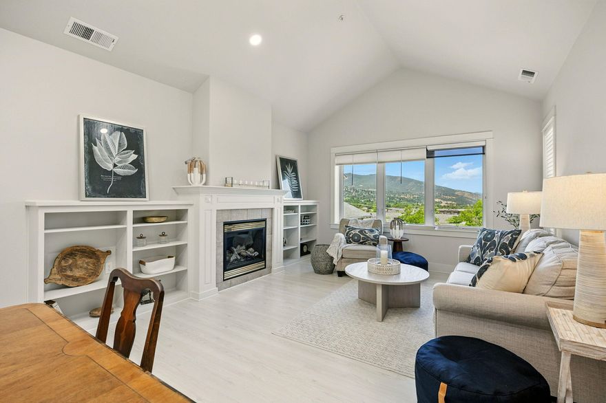 Welcome to 969 Golden Aspen in the beautiful Mountain Meadows senior living community in Ashland, Oregon! This light-filled 2-bedroom, 2-bath condo offers comfort, style, and low-maintenance living. Fresh interior paint, new kitchen and bathroom flooring, and new light fixtures give the space a clean and modern feel. The open-concept living area features vaulted ceilings, large skylight, solar tubes, a gas fireplace with custom built-ins, and large windows showcasing gorgeous sunset views. The layout flows easily, perfect for everyday living and entertaining. The primary bedroom is generously sized with a large walk-in closet. Enjoy the convenience of being close to the clubhouse and community amenities, including a restaurant, fitness center, library, trails, and green spaces. Enjoy the ease of a vibrant, active lifestyle in a beautifully maintained condo tailored for 55+ living.