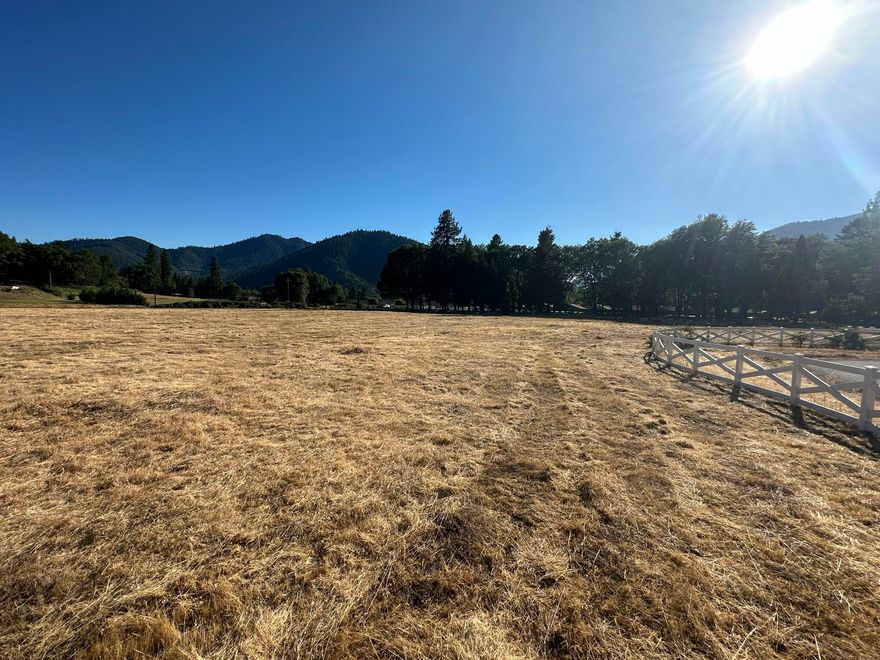 Ready to build your Dream home? Look at this flat, fully usable, and Dividable property. Zoning RR2.5! This residential subdivision lot features natural gas and power at the road. Only minutes away from Downtown Rogue River. Check out the beautiful mountainous views and call it home today!
