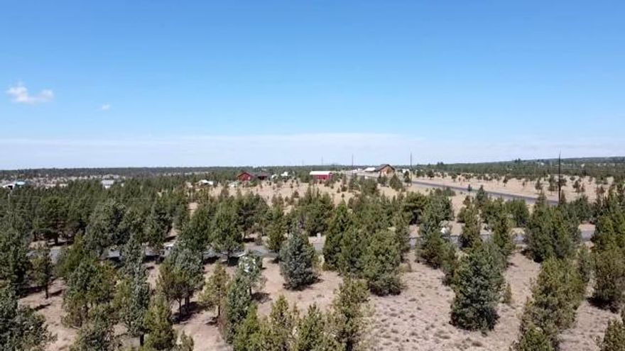 Situated just between the up and coming Prineville and the Reservoir. It's the perfect location for a live and play lifestyle! Just a 7 minute drive to the lake for fishing, boating or hiking, yet only 7 minutes to town. This is a great lot that's ready to build your dream home. Paved streets, flat topography, easy access to power, water and in an area of standard septic systems. Panoramic views of the plateau clear to Grizzly and the Ochocoas!