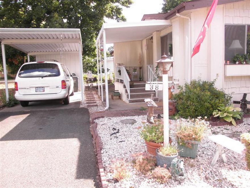 Updated mobile home in 55+ park. Large rooms, open floor plan, double oven in kitchen, newer flooring throughout, minimum upkeep yard with a welcome patio area. Only $21,000.