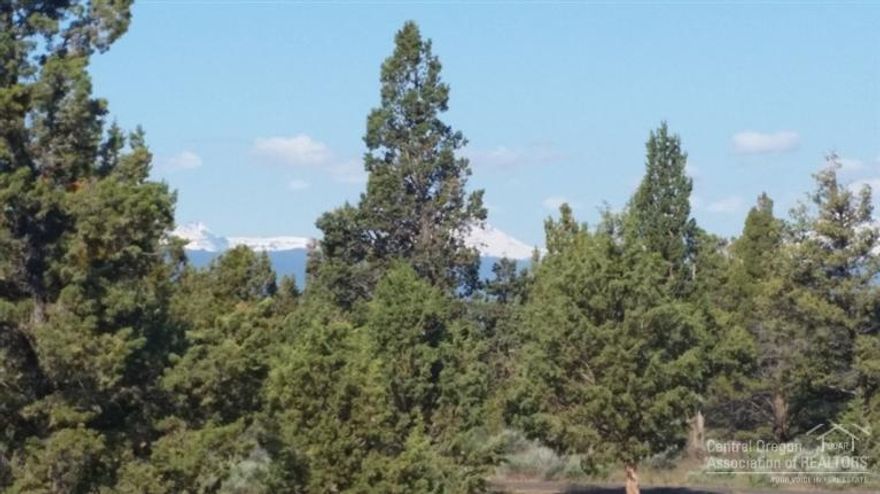 Set far back off the road for peace and quiet to enjoy the Cascade views from two beautiful rock outcropping building sites. Fenced on three sides, this 2.61 acre lot would make a nice spot for horses or gardens. Build your dream home just minutes from Cascade Village Shopping Center while enjoying the country feeling.