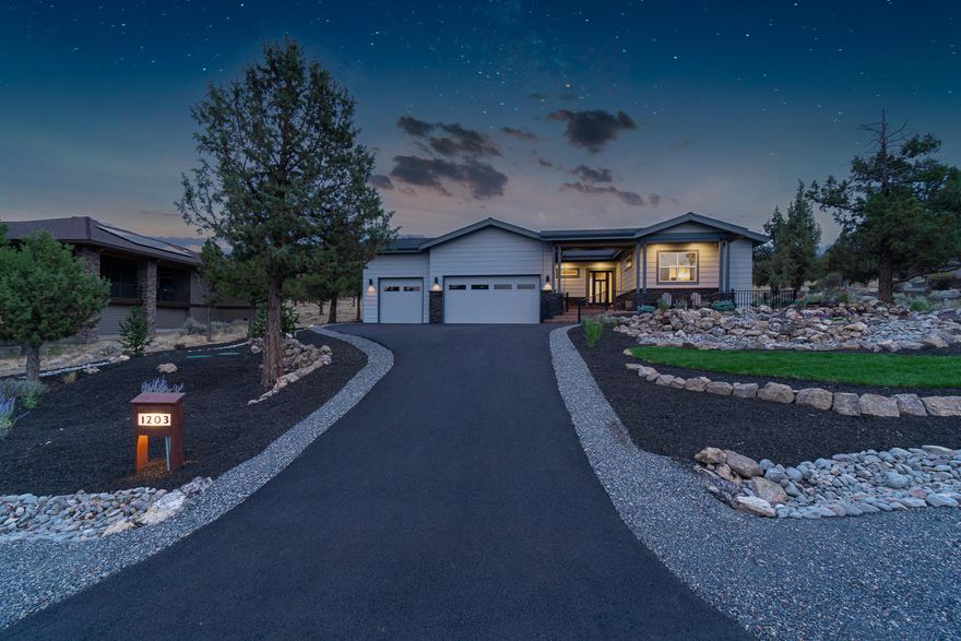 Stunning Northwest Contemporary with coastal accents in Eagle Crest Resort! This gorgeous home was thoughtfully designed and exceptionally crafted with attention to every detail. The great room features a soaring shiplap ceiling, wide-plank European Oak engineered hardwood floors, and floor to ceiling stacked stone gas fireplace with backlighting. Entertainer's dream kitchen with a large island, solid quartz countertops, KitchenAid five-burner gas cooktop, double oven/convection microwave, and huge walk-in pantry with outlets. Primary suite with His and Hers vanities and closets, walk-in, two-person shower with dual shower heads, motion sensor toe-kick lighting, and heated floors. Guest en-suite with walk-in shower, large walk-in closet, and heated floors. Office with double glass doors, and closet for storage. Large utility with sink, built-in cabinetry, and storage closet. Expansive covered stamped concrete patio in back and tiered courtyard in front. Triple car garage.