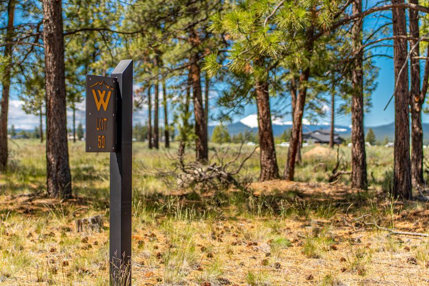 Offers welcome. Perched atop a secluded cul-de-sac in Westgate, one of Bend's newest and finest neighborhoods, this 2.5 acre parcel offers nearly flat topography for an easy build with views in all directions. Sitting amongst a number of mature and majestic ponderosas, this homesite maintains a feeling of openness and allows for long ranging views of the Central Oregon landscape and incredible buttes and mountains that surround us. Westgate is situated within walking distance to Shevlin Park, accessing seemingly endless acres of National Forestland and is just a short bike ride or drive to the shops, dining, trails and all that makes West Bend great. Come experience this unparalleled homesite and start planning your dream home on this rare opportunity in Westgate.