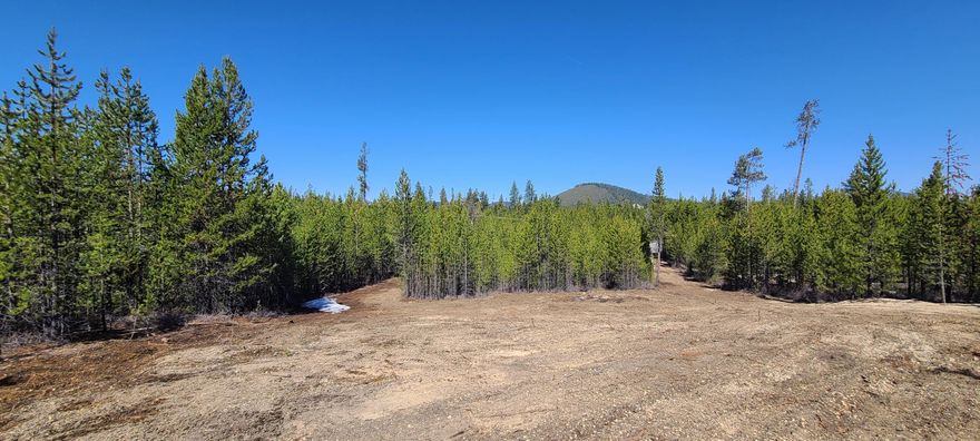 Beautiful gently sloped lot ready to develop your dream getaway cabin. Partial view of Broken Top as well as views of Bunny Butte. Nearby Little Deschutes River makes for great fishing or floating in the summer time. Nearby National Forest land with plenty of trails for motorcycles, ATV's, horseback riding, mountain bikes and more!
