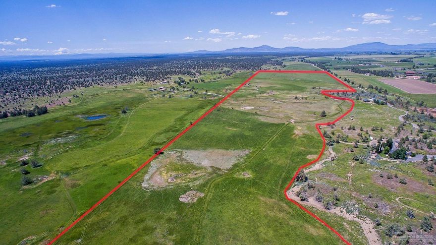 A must see beautifully desirable and convenient Powell Butte location. Home site to with permanent CUP in place for one home site. The north end of the property is prime farmland, with the south making great pasture with still good soil depths in many areas. Well and septic already installed in one location. Multiple ponds located on the property. Approximately 15 minutes to Bend or Redmond. Very close to BLM. A great place to call home for you, your cows, or ??