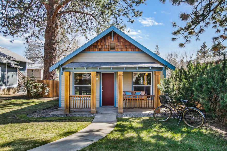 Hard to find RM lot with alley access in premium location on Bend's Westside!  Updated and charming home, basement area with laundry, small workshop space, and lots of storage.  New engineered wood flooring, fresh paint, subway tile, etc.  Fenced with garden beds.  Close to COCC, Downtown Bend, Newport Market, popular eateries, Deschutes River, parks, hiking and biking!  With RM zoning and alley access, you can explore the possibilities of development, add an ADU, or expand the home!