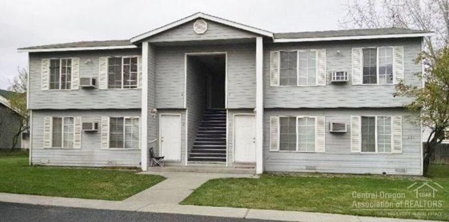 Northwest Redmond 4-plex. All units are 2 bedroom, 1 bath. Two are upstairs & two are downstairs. Each unit has wall air conditioner, range/oven, refrigerator, dishwasher. Large lot with off street parking. Has been professionally managed.