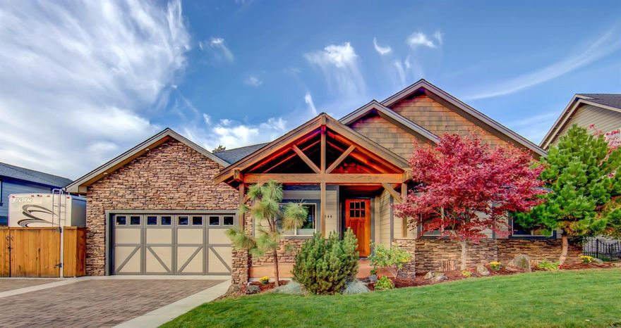 Come take a look at this better-than-new, 2500sq.ft. Craftsman style home with 3 bedrooms and 2 full bathrooms close to the Eagle Point Golf Course with all the upgrades you could ask for! The beautiful entry is complete with stacked stone and custom 8 foot front door. As you enter the great room you will be welcomed by a wide open floor plan filled with plenty of natural lighting from all the windows, skylights and several 8 foot window doors. The gourmet kitchen has 3-CM custom granite counter tops, with top of the line cabinets, stainless Electrolux appliances, a grand island with a 5 element cook-top and additional bar seating. The kitchen is open to the great room with vaulted ceilings and a hand crafted built in fireplace with stacked stone from floor to ceiling. Also, off the kitchen, is a dining/billiard room with a large beautiful window seat with plenty of storage. Make sure not to miss the pantry for extra storage. Off the great room is an office filled with beautiful