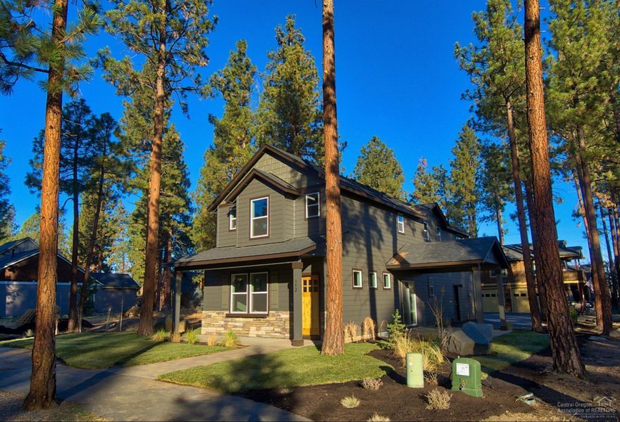 Location is one of the best in Sisters. Within a few blocks of downtown Sisters, close to the elementary school, creek access and city parks. New 3 br. 2 1/2 ba. with loft. Features include: Great room with propane corner fireplace, sliding glass door to the 14'X 14' covered entertainment patio. Well appointed kitchen with stainless steel appliances, propane stove, dishwasher, disposal and attractive cabinet hardware. 2 of the 3 bedrooms have walk in closets. Light and bright interior. Landscaped lot with large ponderosa pine trees limbed to provide an open setting. 2 car attached garage with extra paved parking for an R/V, boat, or 3rd vehicle.