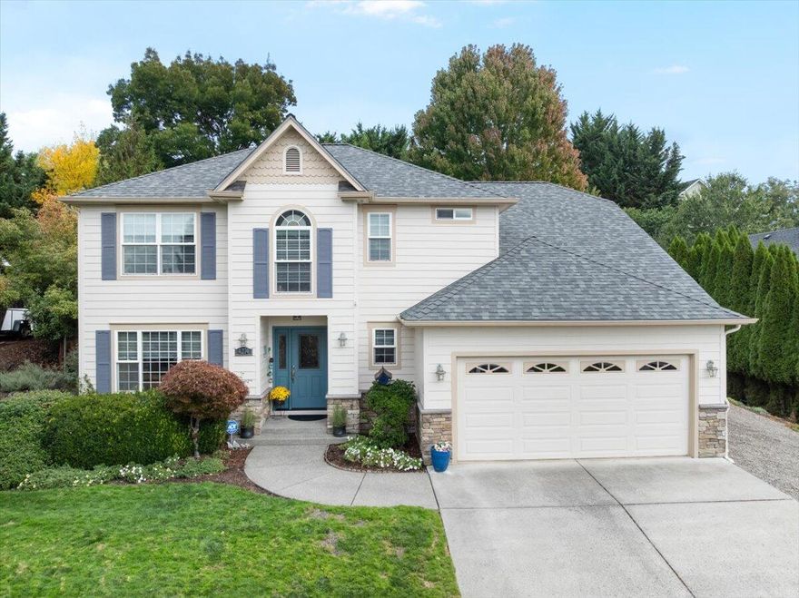 First time on the market! This custom home is tucked into one of East Medford's most desirable neighborhoods. Thoughtfully designed and lovingly maintained, it offers the perfect blend of comfort, function, and style. Step outside to your private backyard retreat. Entertain or unwind on the Trex deck overlooking the sparkling in-ground pool, complete with newer pool equipment, an outdoor water feature, and mature landscaping that ensures maximum privacy.The main-level primary suite features dual closets, a separate shower, and a marble soaking tub for ultimate relaxation. Hardwood floors and fresh carpet on the main level, while a formal dining room, sitting room, and open-concept living area create plenty of space for gathering next to the custom tile fireplace. The kitchen shines with quartz countertops, bar seating, and a seamless connection to the living room. Peace of mind comes with recent upgrades, including a newer HVAC system, three-year-old roof, and updated exterior paint.