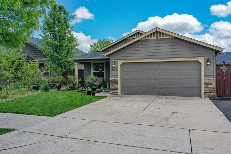 This immaculate home features 3 large bedrooms / 2 full bathrooms and over 1400 sq. ft of living space.  Gated RV parking as well as a two car garage that comes with a Tesla charging station.  Inside you will notice vaulted ceilings and a large living room.  The kitchen has custom cabinets and granite counter tops.   The home has natural light as well as a sliding glass door to the backyard.   Bathrooms also have granite counter tops as well as the large guest bathroom with shower/tub combo.  The master bedroom located at the back of the home has a walk in closet and large bathroom.  Original owners as you can see from the condition of this house.  Inside and outside is immaculate.  Great covered front porch and the RV parking is asphalt.   This is a must tour in a great location.