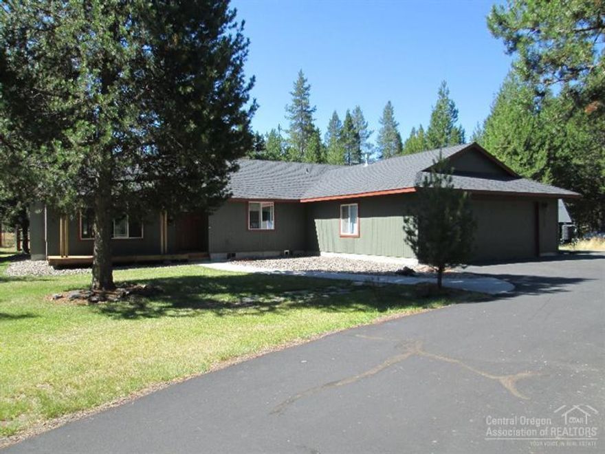 Great Contemporary Home on Paved Road in a very desirable neighborhood, just blocks from the Little Deschutes River on North end of La Pine. Property features a 1.11 acre lot w/beautifully maintained home, 3 beds, 2 baths, 1698 SF w/vaulted ceilings thru-out great room, dining & kitchen. Kitchen well set up w/center island, gas stove, pantry & plenty of storage. Attached 2 car oversized garage & additional 12x16 storage building, country front porch & great back patio area. Call today for a private showing!