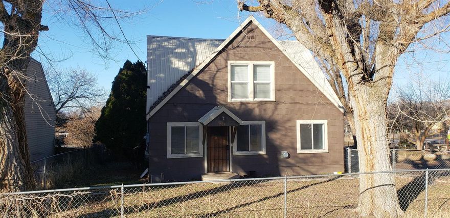 Cash. Two story home priced to allow you to fix it up. Two bedrooms upstairs one on the main floor. Heavily insulated cedar cold room. Large beautiful lot. Close to the sports park. There is an Olive tree in the back yard.