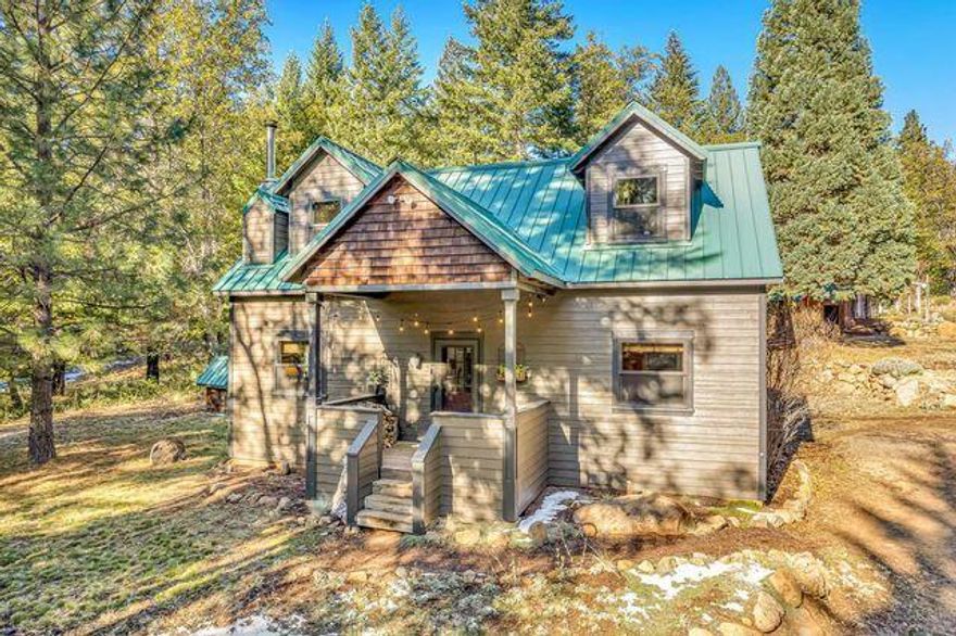 Back on thee market no fault to property.  Enjoy this peaceful setting in the mountains just outside of Ashland. Custom well built home on over 5.5 private acres located in the Cascade-Siskiyou National Monument w/ nearby Tub Springs county park. This mountain home is nice & bright w/ lots of windows to enjoy views of the surrounding large conifer forest. Primary bedroom is on main level. Stainless appliances in the kitchen w/ separate eating nook & walk in pantry. Cozy up to the fireview woodstove in the living room during the winter months. Upstairs has an open living area w/ two bd. & 1/2 bth. Partially covered large back deck for endless entertaining, also has covered front entry porch. Lots of usable land including 3 established fenced garden areas, lined by perennial flower beds. High producing well. Property features fully insulated shop  w/ multiple sheds for all your hobby & gardening needs. This area is known for its outdoor lifestyle, biking, hiking, skiing & water sports.