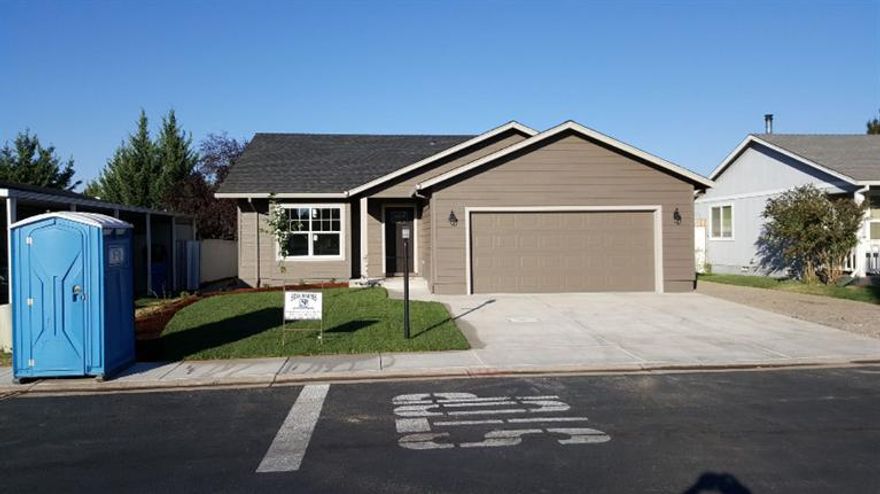 MUST SEE for price. 3 bedroom, 2 bath, vaulted ceiling living room, kitchen & dining room, coffered ceiling in master, walk in closet, granite counter tops, laminate floors, tile bathrooms & laundry room, fully fenced and landscaped.
