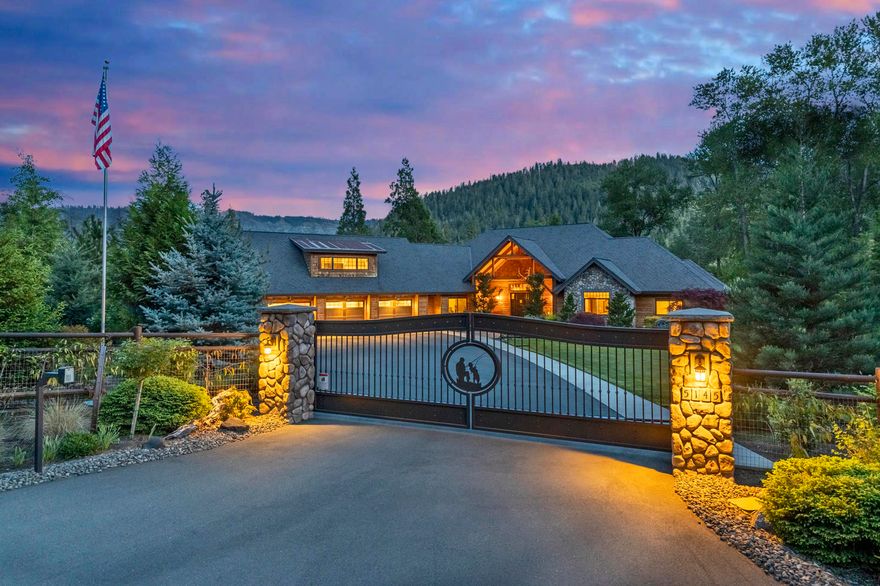 One of the finest riverfront estates in Southern Oregon! This Pacific Northwest Craftsman style home features Fir truss beams/rough sawn timbers/trim work/custom crafted Knotty Alder-hand knurled entry doors/Heart Pine reclaimed wood floors/towering vaults/massive stone fireplace/Sierra Pacific wood windows/spectacular views of the famous Rogue River/chef style kitchen w/Rustic Hickory cabs./granite slabs/tile backsplash/cast iron farm sink/Wolf 6 burner gas stove/electric oven/plus Kitchenaid double wall convection oven/microwave/Sub-Zero refrigerator/plus Sub-Zero drawer cooler/freezer combo in center island/covered/enclosed patio/entertainment area w/electric screens/built in BBQ/custom stained concrete/overlooking park-like setting/river. Master suite w/stone propane burning fireplace/travertine floors/his/hers sinks/clawfoot tub/locker style shower/private water closet w/bidet/huge closet. Office/den/addl. gaming areas/bonus rooms. RV Pkg.-hook ups/security gate/irrigation rights.