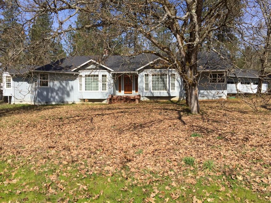 Great location in the Colonial Valley Subdivision. Featuring 4 bedrooms, 2.5 baths, 3056 sq ft, on 1.03 ac lot. Spacious kitchen with a pantry and dining area that is just a few steps through the covered breezeway to the huge 3 car garage/shop combo. This home is situated in a friendly neighborhood with just the right amount of privacy! Perfect amount of sun and shade for your garden and fruit trees! The decks off family room and master bedroom make enjoying the fenced in, peaceful back yard easy! This home is very open and spacious with many other features. New roof 8/17, new deck, HVAC system about 7 years, septic system fairly new, hot tub stays...