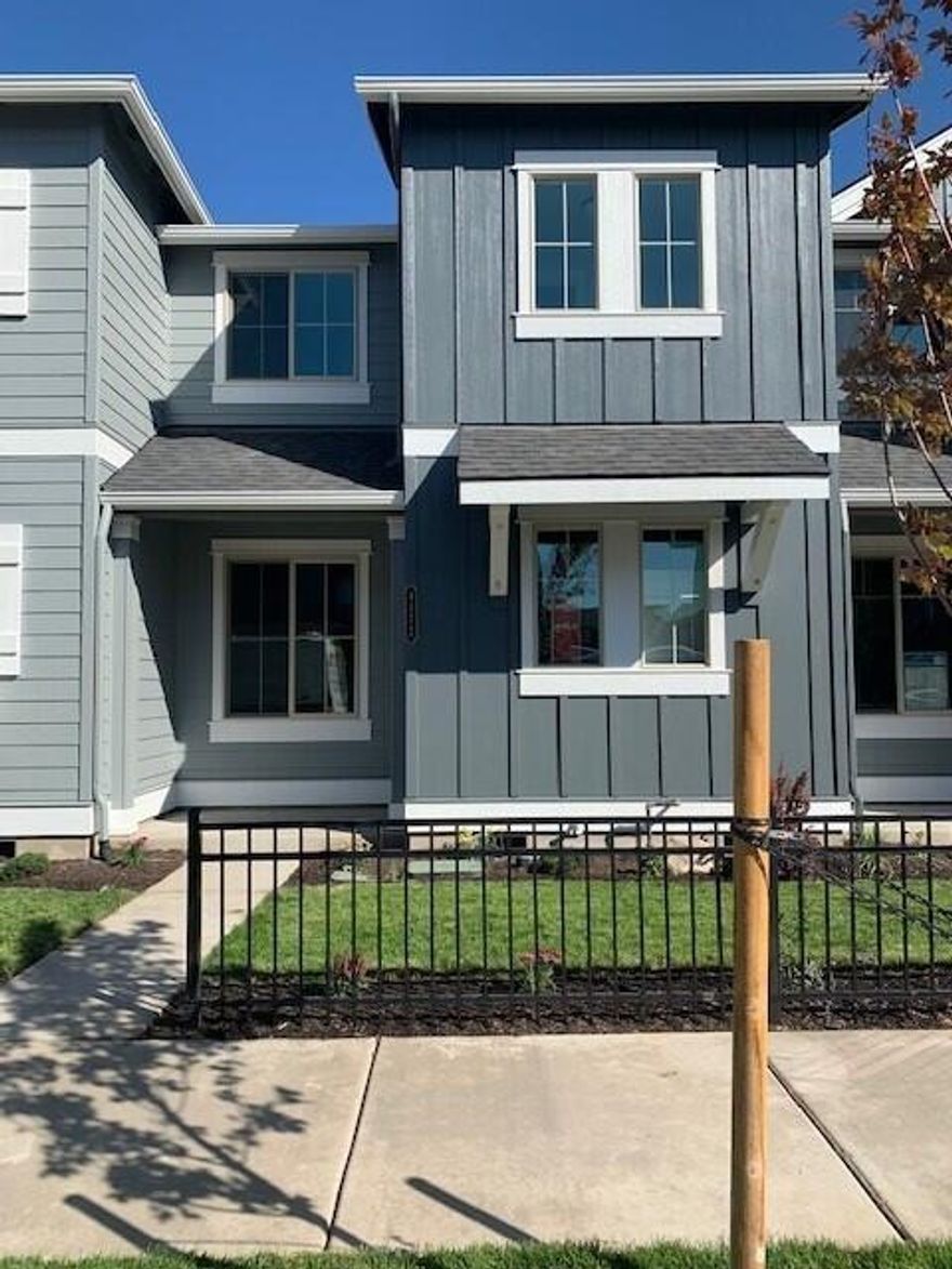 Quincey townhome by award winning quality builder Pahlisch Homes.  You will love the open concept kitchen/dining/great room. Cozy gas fireplace.   Quality finishes include: Shaker style white  cabinets, Quartz kitchen & bathroom counters, stainless steel appliances, luxury vinyl plank flooring throughout main floor, bathrooms and laundry.  Double wall construction for added insulation, Hardie Plank lap siding,  skylights and gutters. Beautifully maintained neighborhood off of SW Canal with easy access to Bend or Redmond. Photos are of similar floorplan in different communit, specs vary. Front yard landscaping and AC pre wire included.   Late Summer 2021 estimated completion.