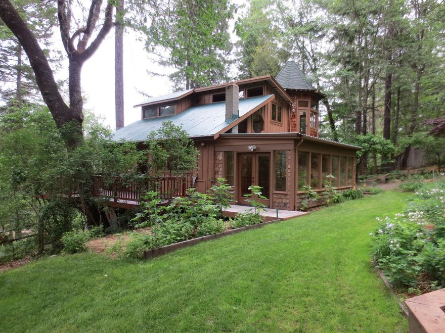 Fabulous Forested Home and property! Custom built by a local highly regarded builder as his private residence.. the 3 (easily 4+) bedroom, 2 bath home is peacefully tucked into the trees, backed by National Forest and offers year round creek frontage. Lots of custom woodwork, oak floors, tile and granite used throughout the home. With over 2200 square feet the house itself is cozy with a beautiful sunroom to take in the many garden areas and a relaxing sauna. There is a separate 30x30 shop with a office/game room above. Sitting on 11.7 acres this property is a very special offering. All information is deemed reliable but not verified; anyone considering purchasing this property should perform their own investigation into the uses and condition of the property.