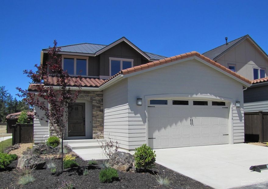 This gorgeous new home accommodates a master bedroom/bath, large kitchen/dining area and spacious great room with a fireplace on main level. 3-bedrooms, loft area & laundry room at top of stairs. The kitchen features solid surface quartz composite countertops w/tile backsplash and stainless steel appliances. Full bathrooms have quartz composite counters/tile backsplashes and undermount sinks. Master has dual vanity, tile shower & walk-in closet. Covered entry/back patio for indoor/outdoor living space.