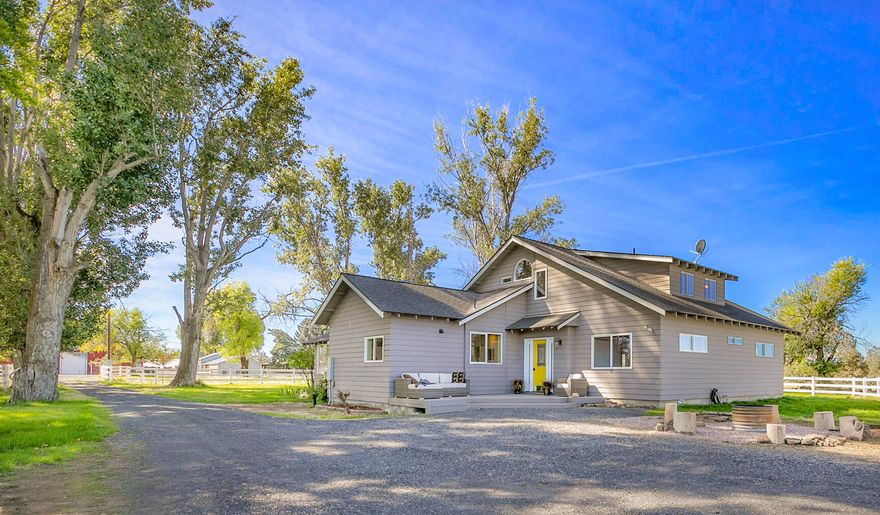 Incredible property with updated modern farmhouse and private river access! Come see this unique 12 acre property that sits on the edge of a canyon rim with access to the Deschutes River. The updated 2,704 sqft, 4 bed, 3 bath house is a charmer! This home features a large country kitchen with a classic farm sink, wood floors, vaulted ceilings and custom finishes throughout. The home's many windows offer tons of natural light and fantastic views. This property boasts six acres of irrigated pasture, and nearly 700' of river frontage. Have your coffee at the canyon overlook which offers spectacular views of the mountains and river below and is an ideal spot for observing wildlife and bird watching. Or take a hike on your own river trail where you can fish or swim in your private river escape! You have to see this property to appreciate the spectacular location, inviting home and amazing views.