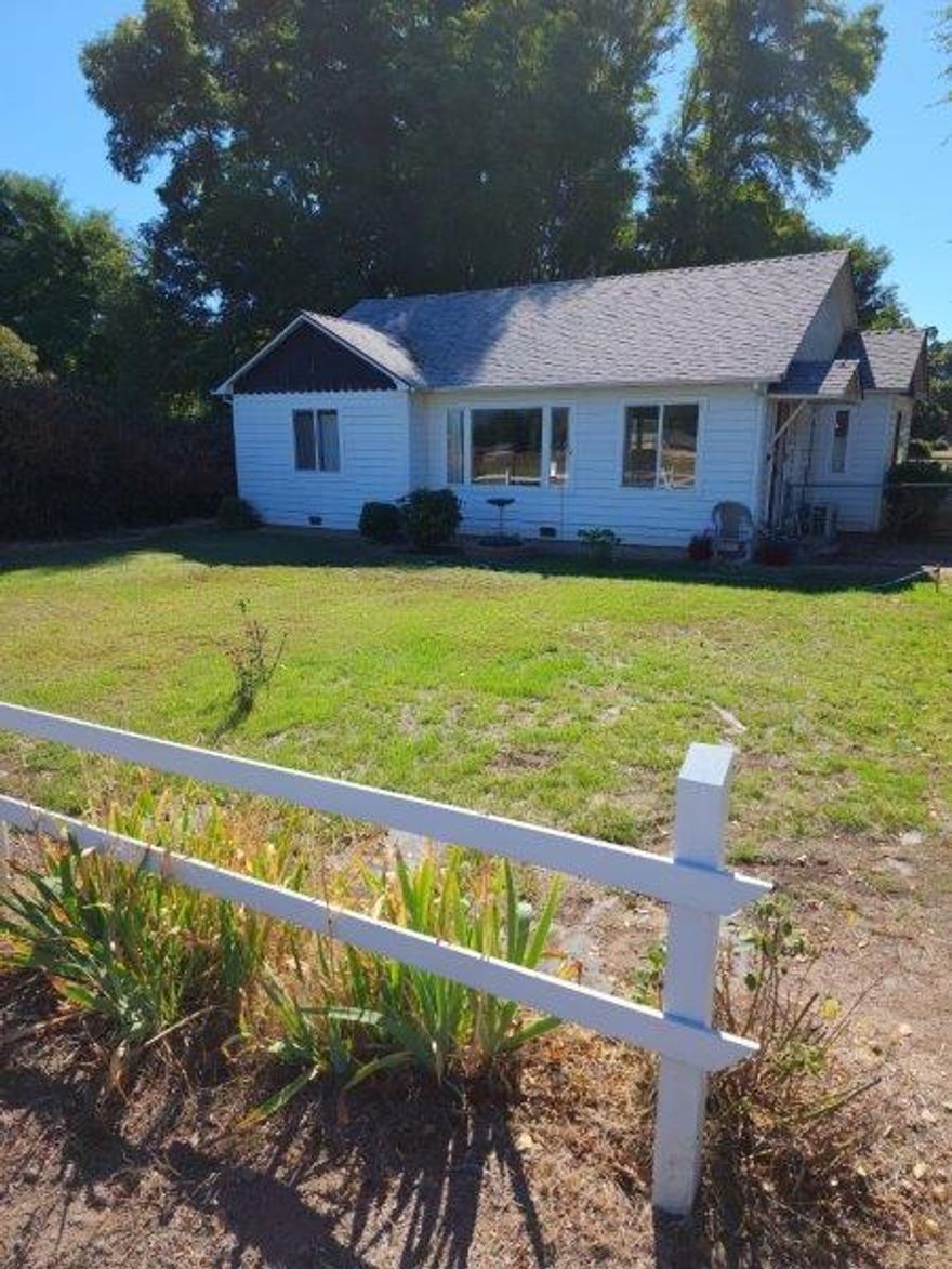 Charming older home with 2 bedroom 1 bathroom floorplan. Recently updated bathroom with Marlite walk-in shower and counter top. Spacious kitchen, living room. Great pastoral and mountain views. Irrigated off Fort Vannoy ditch. Detached dbl car garage.
Great location for horses, goats, fruit trees or large garden. Small fenced backyard too. Great property close 6to GP shopping, etc. Newer split heating/ac unit (Dankin) and roof is less than 10 years old (per seller).