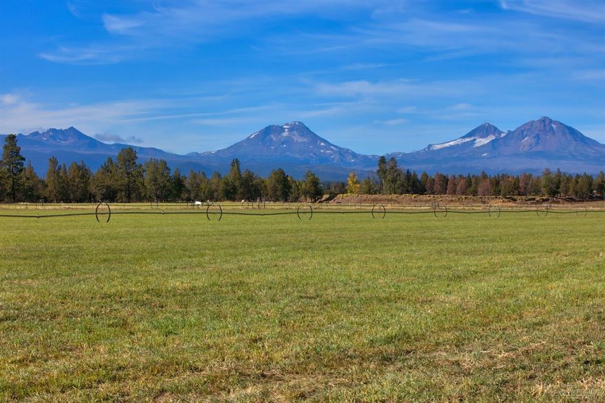 Central Oregon farm and building site. 171 acres with 98.9 acres of Three Sisters Irrigation Water Rights. Fields are planted in grass hay, alfalfa and alfalfa/grass mix and irrigated with wheel lines. Irrigation system is pressurized delivery with no power bill for pumping. Current Home built in 1900 is a replacement dwelling and location can be moved on TL 800. Building site has Cascade Mountain views overlooking the large pond. The historical site on the corner of Jordan/Cloverdale Road is the Enoch Cyrus Homestead Hay Station. Property is located between Bend and Sisters with a private setting for any Central Oregon Lifestyle.