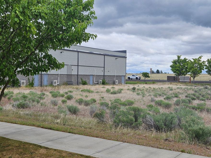 Prime 1.20 acres industrial zoned lot in Jefferson Business Park. The lot fronts Hwy 26 with access off of NW Andrews Dr. Great investment or location to place your business.