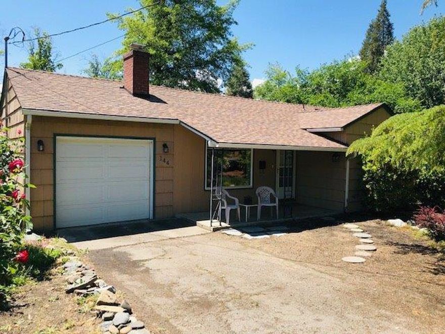 Vintage eastside home in immaculate condition. New roof with transferable warranty. Stunning hardwood floors throughout. Large living room with classic fireplace and hearth. The kitchen is well lit with a built in food pass thru. Lots of wood cabinets and countertop space, deep dish sink, fridge, dishwasher, cooktop and oven. There is a window studded addition that can function in many ways, you decide. Its a great multipurpose room with access to the covered patio and security fenced expansive backyard. Additional kennel area. The extended master bedroom also offers large closets and cabinets for storage. The additional space would make a great reading room or office area. A centrally located home at a competitive price. Home Warranty Included.