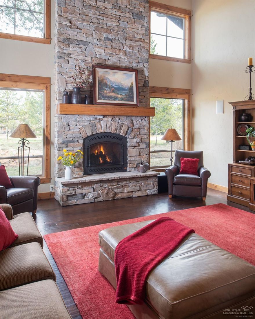 This one-of-a-kind custom-built Northwest home offers scenic views of the Woodlands Golf Course. Inside, you will find 4 bedrooms (3 suites) and 4-1/2 baths. Two suites are located on the main level, with the 3rd suite upstairs along with a room with bunk beds, perfect for the kids. Upstairs also features a bonus room plus loft area so plenty of room for the group to spread out. The spacious and open kitchen offers granite counters, stainless steel appliances and island with seating. The great room boasts floor to ceiling stacked stone fireplace and a bank of windows to let in all the natural sunlight in. Maple hardwood floors and knotty alder cabinets give this home the complete NW Sunriver feeling. Take the time to unwind and enjoy the view from the back-paver patio after a day visiting the nearby cascade lakes or soak in the hot tub after a day exploring. Zoned heating, two furnaces with A/C, central vac. Extended bay in garage w/ work bench. Ready for your enjoyment.