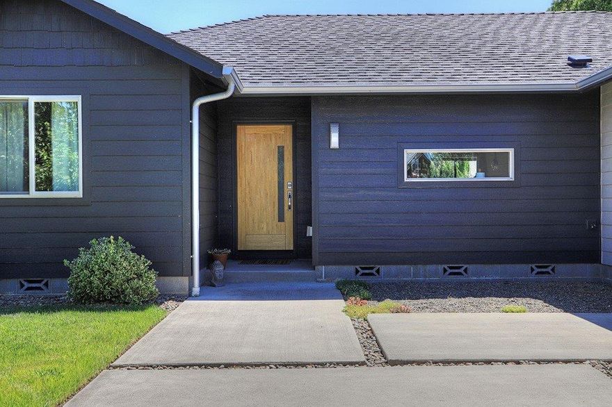 Looking for an affordable custom home? This is it!! Comfortable split bedroom floor plan with 3 bedrooms, 2 full baths all situated is 1428 square feet. The open Great room has vaulted ceilings, sliding glass door to the back yard and kitchen with breakfast bar, pantry, range/oven, dishwasher and microwave. Master bedroom has a large walk-in closet with en suite bath with double sinks and shower. This modern home has a contemporary kitchen with energy saving lighting and beautiful floors and fixtures throughout. There is a nice sized laundry room right off the garage. Featuring a sizable fenced backyard with t raised garden beds. Close to town, shopping, medical facilities and easy access to I-5 . Anyone considering the purchase of this property should perform their own investigation into the uses and conditions of the property.