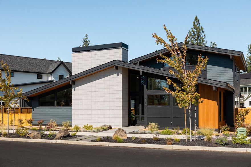 Modern design + uncompromising craftsmanship come together to create your dream home in Discovery West! Upon entry, you'll notice the stunning natural light + white oak hardwood floors that create a captivating ambiance throughout. On the main floor you'll find the ideal + open floor plan including the kitchen, dining + great room, along with the primary suite, true office + powder room. The kitchen features cafe appliances, an oversized 48-inch built in fridge, quartz countertops+a waterfall island with stunning oak accents. Enjoy the perfectly cohesive indoor+outdoor living areas that are ideal for entertaining all year long. The mudroom with ample storage leads into the 3 car garage w/ a bay for your sprinter! Upstairs you'll find 2 other rooms, a bright+beautiful bathroom, 2nd story balcony+loft perfect for an additional office or yoga + meditation room. This location is truly unmatched, w/access to some of Central Oregon's best trails, restaurants + more