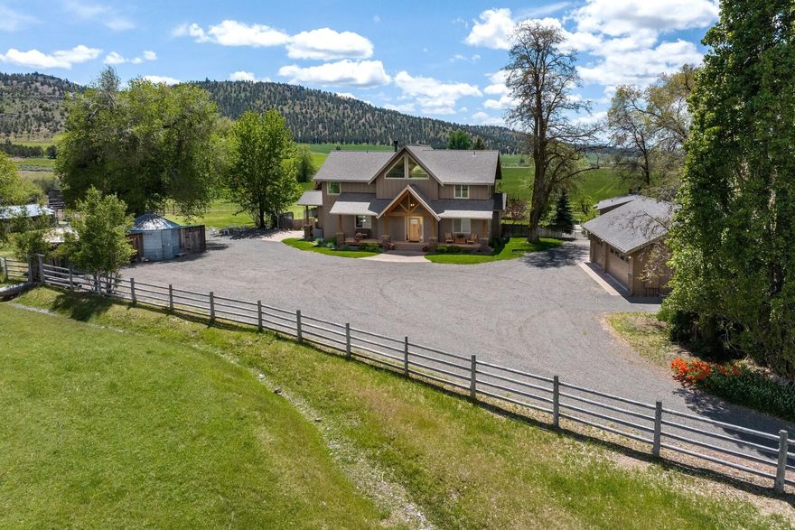 Custom NW Style Home on 6.44 acres with McKay Creek frontage with beautiful valley and Ochoco Mountain Views. This home has an open floor plan, 2768 sq ft, 3 bedrooms, 4th bedroom/office, 3 bathrooms, dining room, chefs kitchen with breakfast bar. The home features quality finishes throughout, reclaimed barn wood, wood stove with stacked stone fireplace, vaulted ceilings and natural light. Wonderful outdoor living with deck, hot tub, covered front porch and landscaped/fenced yard. Property: 6 acres seasonal creek water rights (future conversion to Ochoco Irrigation District),detached 3 car garage/shop, outbuildings/barns, office/guest studio and green pastures. The property is conveniently located 5 +/- miles to the National Forest, but it is close to town in the desirable McKay Creek Valley