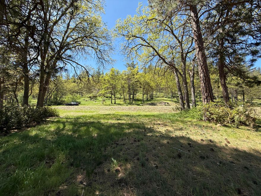 Beautiful and scenic ready to build lot located at the Running Y Ranch Resort.  This lot features mature trees in a scenic setting.  Running Y Ranch Resort is known for its numerous homeowner amenities which include a fitness center, indoor pool and sauna, tennis, pickleball, and basketball courts, playground, paved trails, wildland trails, and a fishing pond. Resort perks feature an 18-hole Arnold Palmer golf course, spa, dining, skating rinks, and more. The community hosts regular social events—ideal for meeting new friends.  A must-see opportunity!