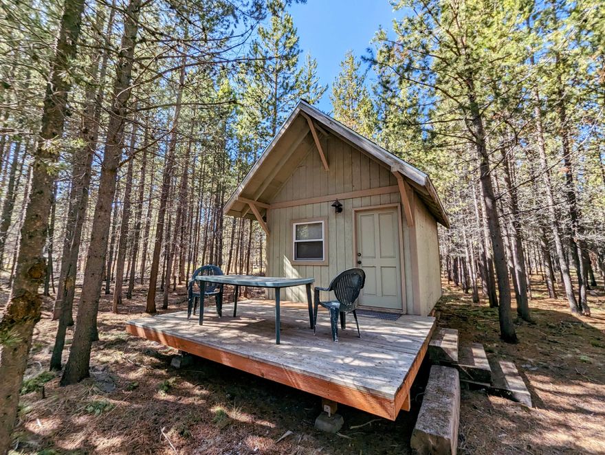 Rare buildable 2.39 acre lot with approved septic in La Pine's desirable Lazy River South. This level, wooded and partly cleared lot offers plenty of privacy and backs up to the Quail Run Golf Course. Build your dream home or use as a vacation getaway. Area of shallow wells. Fenced and cross fenced for horses or other critters! The paved county road leads to a gated gravel driveway leading to a partially cleard homesite. Power is on the lot and fiber optic at the road. There is a small 200sf cabin and converted construction trailer that go with the property.  Downtown La Pine is only about 12 min away, Sun River is about 15 min, and Bend 30 min. There is so much to do and see in this area especially if you love the outdoors! Launch your small watercraft just down the road on the Little Deschutes or visit one of the several other close rivers and lakes in the area.  See why La Pine is truly the hidden gem of Central Oregon