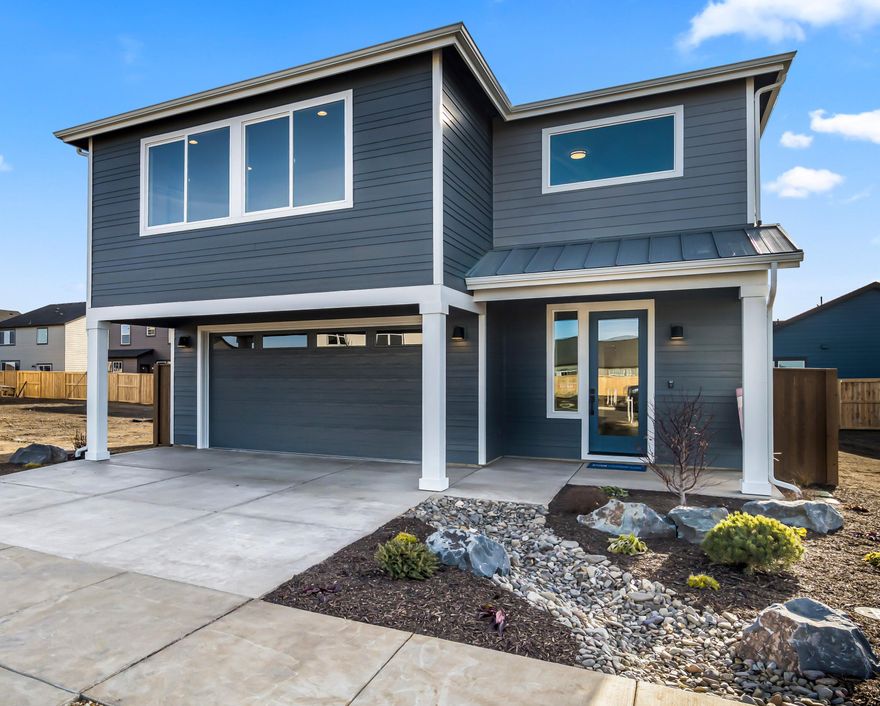 This new home in the Stevens Ranch neighborhood of Bend is the perfect fit. You will fall in love with the quartz countertops, stainless steel appliances, and carefully designed layout that maximizes the use of every inch of space. The main level features an open-concept living area with a floor-to-ceiling tile fireplace and built-in shelves. On the upper level, you will find three bedrooms and a bonus room. The primary suite has two walk-in closets, a large tile shower, and dual vanities. The home is Earth Advantage certified and includes a landscaped front and back yard, fencing, a Ring doorbell, a Nest thermostat, a 220-volt plug for an electric car, and air conditioning. You have everything you need to make it the perfect home. Stevens Ranch features parks, caves, walking paths, nearby shopping, restaurants, and the new Bend library.