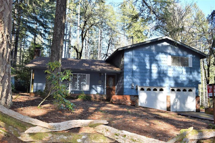 Beautiful 3 bedroom split level home features open living/dining room, additional family room, two car garage, and large covered patio/gazebo, all on 4.71 acres. A must see!