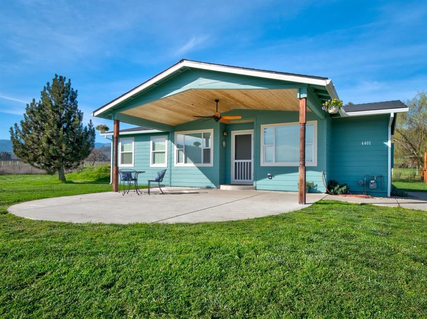 Back on the market through no fault of the property! Three acres in Central Point! Must see! This property features a large fenced garden with drip irrigation lines, two raised garden beds, a basketball court, and a covered front patio with a ceiling fan and views of McLoughlin and the Table Rocks. in addition to a seasonal creek running through the fenced and gated dry lot, there's a seasonal pond in a separate fenced pasture. Finally, there's a hay and horse shelter with feed boxes, and a large chicken coop with chicken run. The home was remodeled down to its studs in 2015, and has 3 beds and 2 full baths, including a master suite. The home features 9-ft ceilings, updated floors, granite countertops in the kitchen and master bath, stainless steel appliances and island hood. Schedule your showing today!
