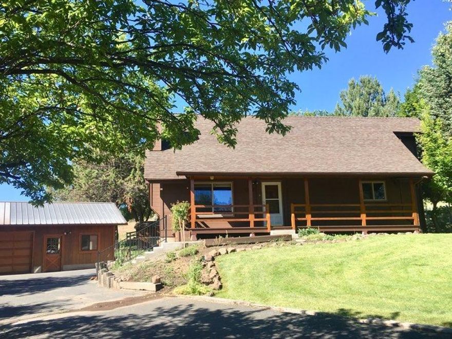 $264,900, A frame 3/2 plus (master bed and bath in the loft with room for an office space}, main level has open living space with a certified wood stove, 2 bedrooms and bath, huge storage room and bonus room downstairs. Outside is freshly painted, decks are being stained. Two wells, one for domestic water, one for watering outdoors, some fruit trees. Large detached garage seller says 3 car, I say 2 with a finished shop. Some fruit trees, almost at the end of Valley View on the left. Vacant with LB, owner says bring us an offer''!