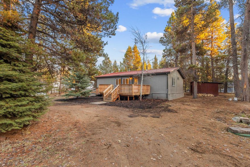 COMPLETELY remodeled home in tranquil wooded setting waiting for you to enjoy!  New paint inside and out, new drywall and texture, new trim, new layout inside, new flooring throughout, all new plumbing, new well, new gutters, new back deck, new cabinets, new countertops, new lighting features and sinks.  New microwave/range hood combo and appliances that are new to this house.  The large shop boasts a long workbench and plenty of space to complete your big projects and house your outdoor gear.  Come, walk the grounds, and make this amazingly remodeled house your home!