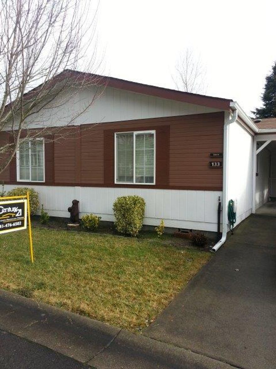 This beautiful 1994 manufactured home is well kept and maintainedIt is MOVE IN READY. Vaulted ceilings, thermal windows and skylights bring lots of light to this wonderful home. You will be able to walk out your bedroom to a private patio and enjoy a landscaped yard. There is a perfect workshop all set for the Hobbyist. A pet is allowed under 35lbs. This is a great opportunity to be close to everything Grants Pass has to offer and live in one of the best parks in town.