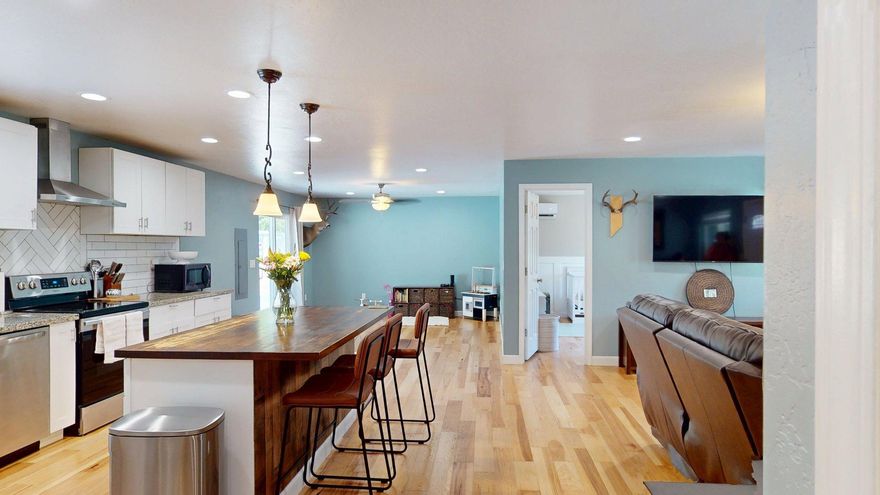 An absolutely stunning remodeled home, resting on 1.2 acres, and just on the edge of town. Home is approximately 1560 sq ft, offers 3 bedrooms and 2 baths. Open floor plan, with new wood floors, granite counter tops, new vinyl windows, cabinets, and custom tile backsplash. Plenty of natural light, and attention to detail creates a very welcoming feel and comfort. Good amount of yard space for gardening, RV boat storage, and a shop. Take advantage of a turn key home, at a great price point.