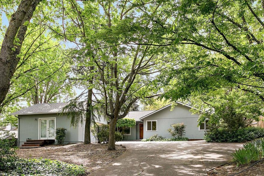 Situated on a quiet cul-de-sac in the Helman School district, this lovingly updated single level home is a joy to come home to. Located on an oversized .37 acre lot, the home sits back on a long driveway to create ample privacy. A level front entrance welcomes you with open, vaulted ceilings and wide-plank hardwood floors. A 2004 remodel transformed two small bedrooms into a spacious master suite, that includes wood framed glass slider doors leading to the serene backyard. Both the oversized living area and a dining area boast the same glass doors overlooking the private back patio. Vaulted ceilings frame the light-filled kitchen and lead to the laundry room and half bath. New roof, exterior paint, all new duct work in May 2018. Don't miss this opportunity for a uniquely private setting in town!