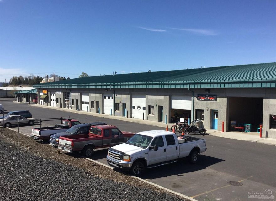 Easy keeper. Built like Fort Knox, all concrete - 6 offices - 18 commercial/retail spaces - 35 storage units, all on 2.73 acres of high traffic area. Lots of off-street parking, presently 100% occupied. Please do not bother tenants.