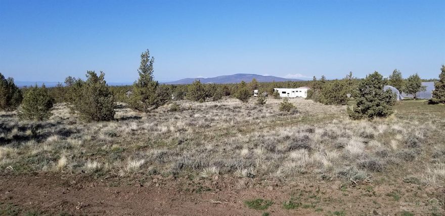 Beautiful 5 acre lot with Cascade Mountain views. Bring your horses for this lot with so much potential. Manufactured homes ok. No HOA no CC&R
