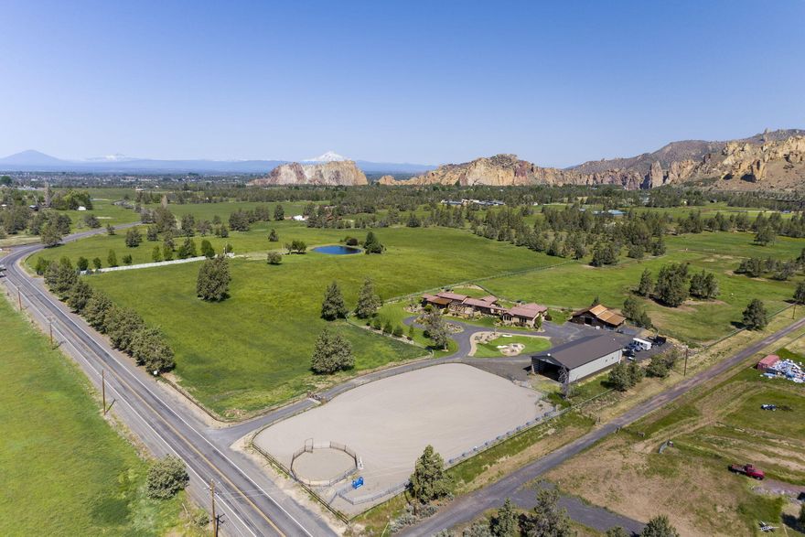 This incredible estate truly is a must see and checks all the boxes!  Breathtaking views of Smith Rock, an outdoor kitchen/entertainment area, and even a golf green with elevated T box are just a few of the amazing amenities offered. This equestrian property includes 37 acres w/ 27 irrigated acres, and pop-up sprinkler system for easy maintenance throughout the yard, pasture, and hay fields!  You will also find a barn, shop, hay storage, outdoor arena, and the property is fully fenced & gated for privacy. Top of the line chef's kitchen, butlers' pantry, and temperature-controlled wine cellar, with ornate finishes and custom touches throughout make this home very unique. Through the breezeway you'll find a Casita for guests which includes one bedroom, full bath, kitchenette, fireplace and views to die for. You'll even find a little ''campsite'' tucked away with a full RV hook up and stone firepit to enjoy the fresh air and views. The best part is no CCR's or HOA's! Just STUNNING!