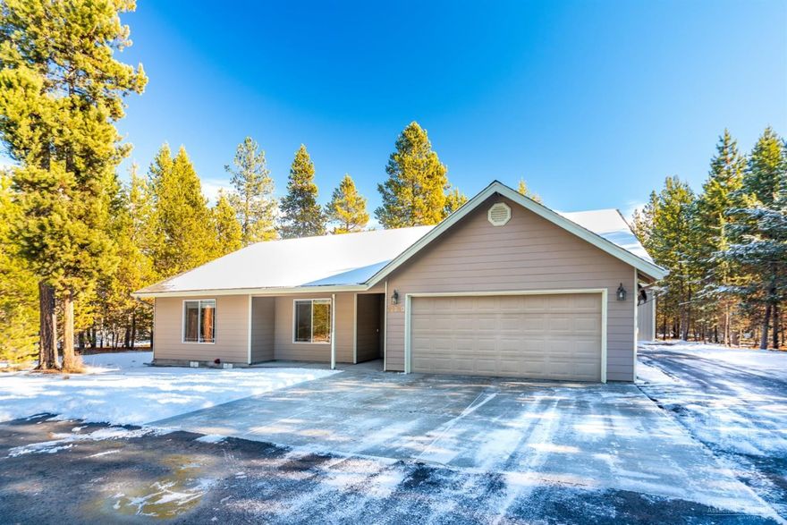 Beautiful 3 bed 2 bath custom built home on just over 1 acre. Hardwood floors, completely remodeled master bed bath with heated tile floors. New interior and exterior paint, central Vacuum, gas fireplace with stone accents, Hickory cabinets, large kitchen and pantry, forced air electric with heat pump. Finished two car garage, front and back covered porches. Paved driveway, additional storage buildings, 24'x40' shop with lots of room for RV's and toys. Low maintenance yard in a great neighborhood.