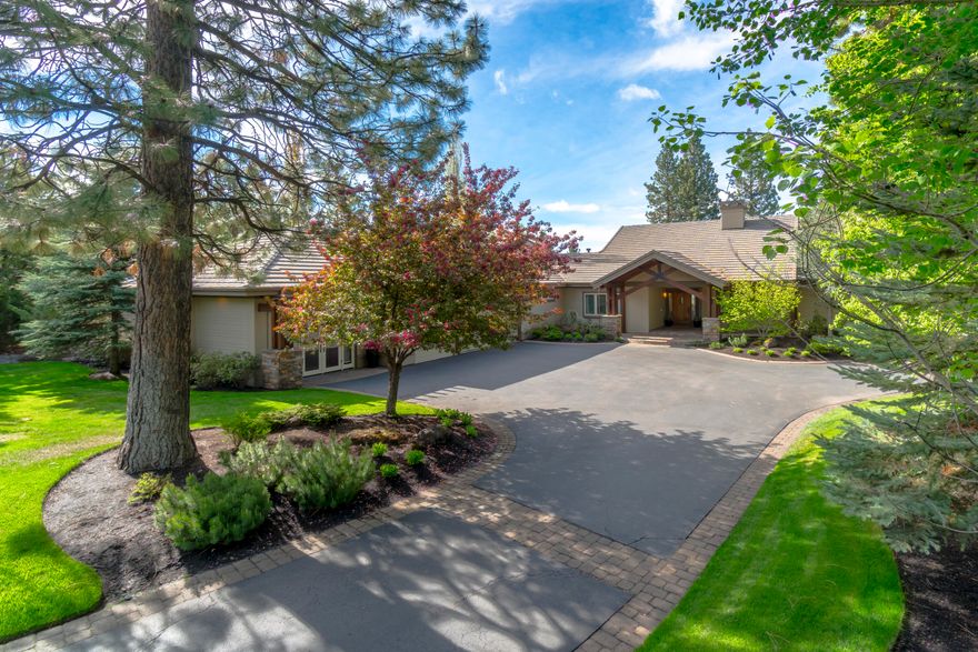 Premier single-level home in Broken Top on a level, south-facing 1/2-acre lot situated on the 17th fairway. Golf course views featuring pond, ponderosa pines, and southern hills. Beautifully renovated throughout creating an up-to-date, clean and bright feel with designer touches. 3BR/3BA in the main house, with rare, private separate entry suite including office, bedroom and bath. Perfect for working at home or a guest suite. The main living area has hickory hardwood floors, vaulted ceilings and huge windows facing some of the best views in Broken Top. Bar seating, stainless steel appliances, beverage fridge, dual zone wine fridge, ice maker and dining room are all ideal for entertaining. Wonderful skylights, 3 gas fireplaces, large patio, deck and lawns. The master suite is on its own wing with a huge walk-in closet and French doors opening to the patio and hot tub. Oversized 1,190 sq ft 3-car garage with enclosed storage room and custom-built cabinets.